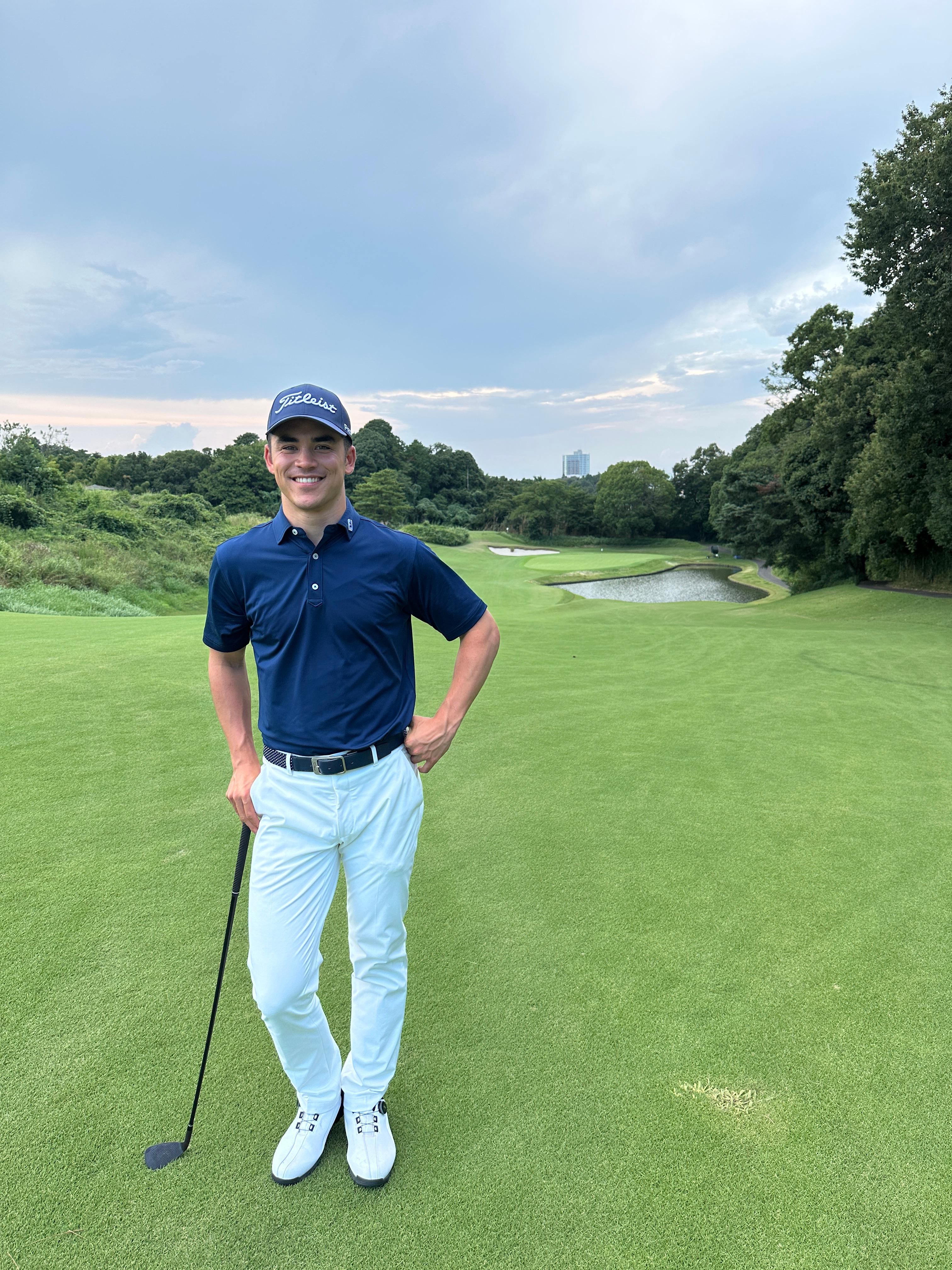 Louis on the golf course wearing Titleist gear