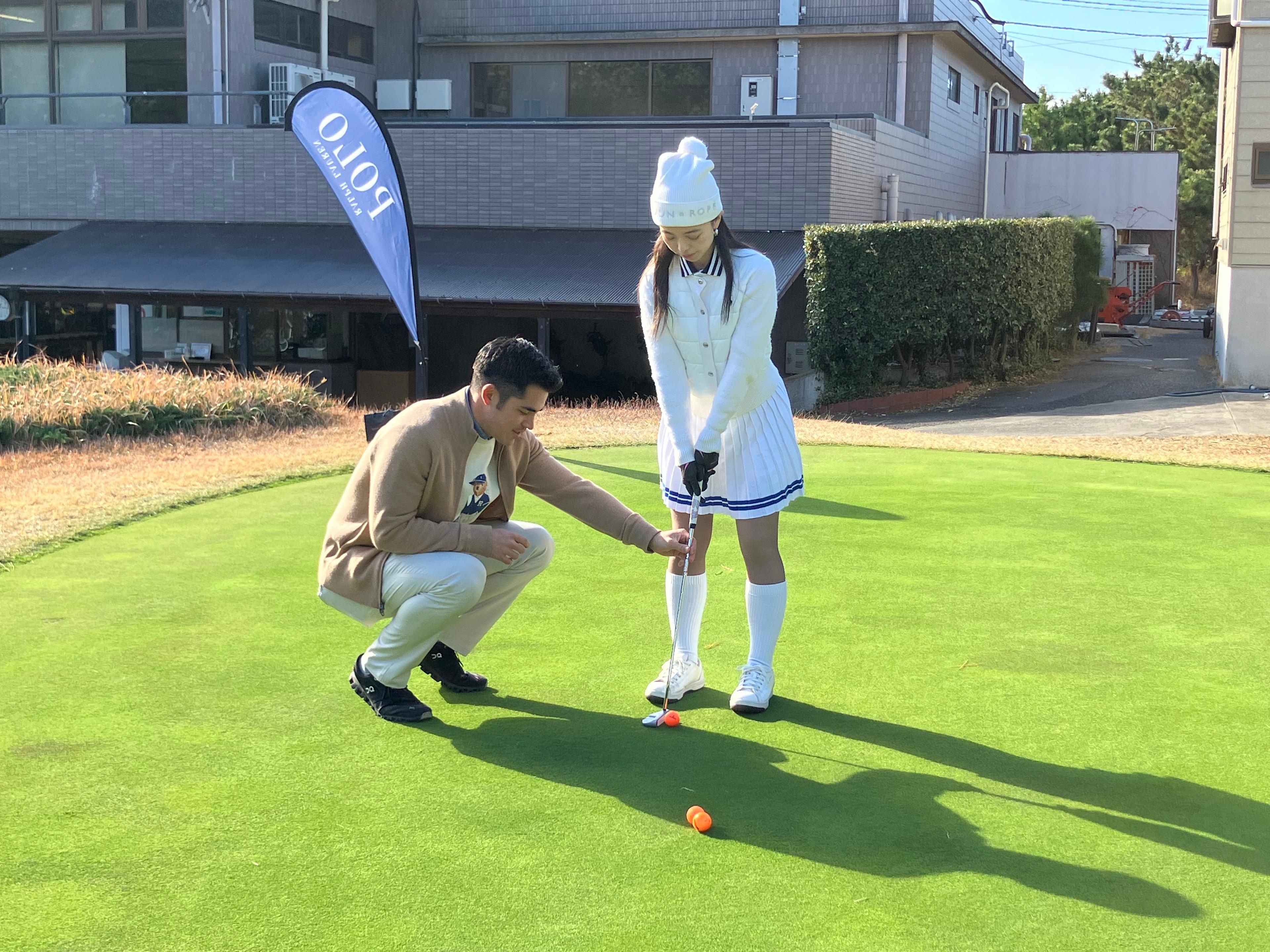 Outdoor putting lesson on the green
